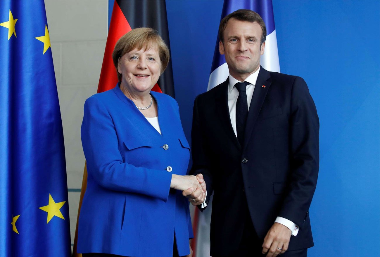 ميركل-وماكرون