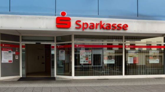 Neuwied, Germany - March 16, 2021: facade and showcase of the lettering and the logo of the German thrift "Sparkasse"
