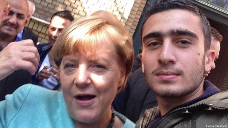 syrian_refugee_anas_modamani_and_angela_merkel