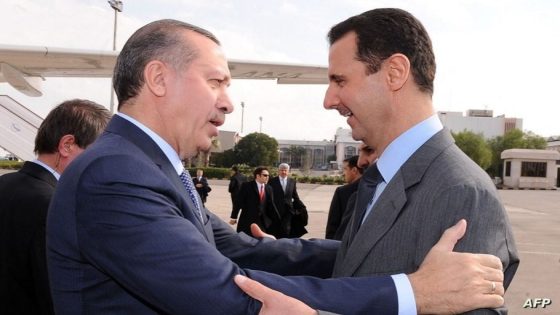 EDITORS NOTE -- RESTRICTED TO EDITORIAL USE - MANDATORY CREDIT "AFP PHOTO/SANA/HO" - NO MARKETING - NO ADVERTISING CAMPAIGNS - DISTRIBUTED AS A SERVICE TO CLIENTS -
A picture released by the official Syrian News Agency SANA shows President Bashar al-Assad (R) welcoming Turkey's Prime Minister Recep Tayyip Erdogan at Damascus airport on January 17, 2011 ahead of their summit meeting with Qatari leader Sheikh Hamad bin Khalifa al-Thani to discuss the current political turmoil in Lebanon. AFP PHOTO/HO/SANA (Photo by SANA / AFP)